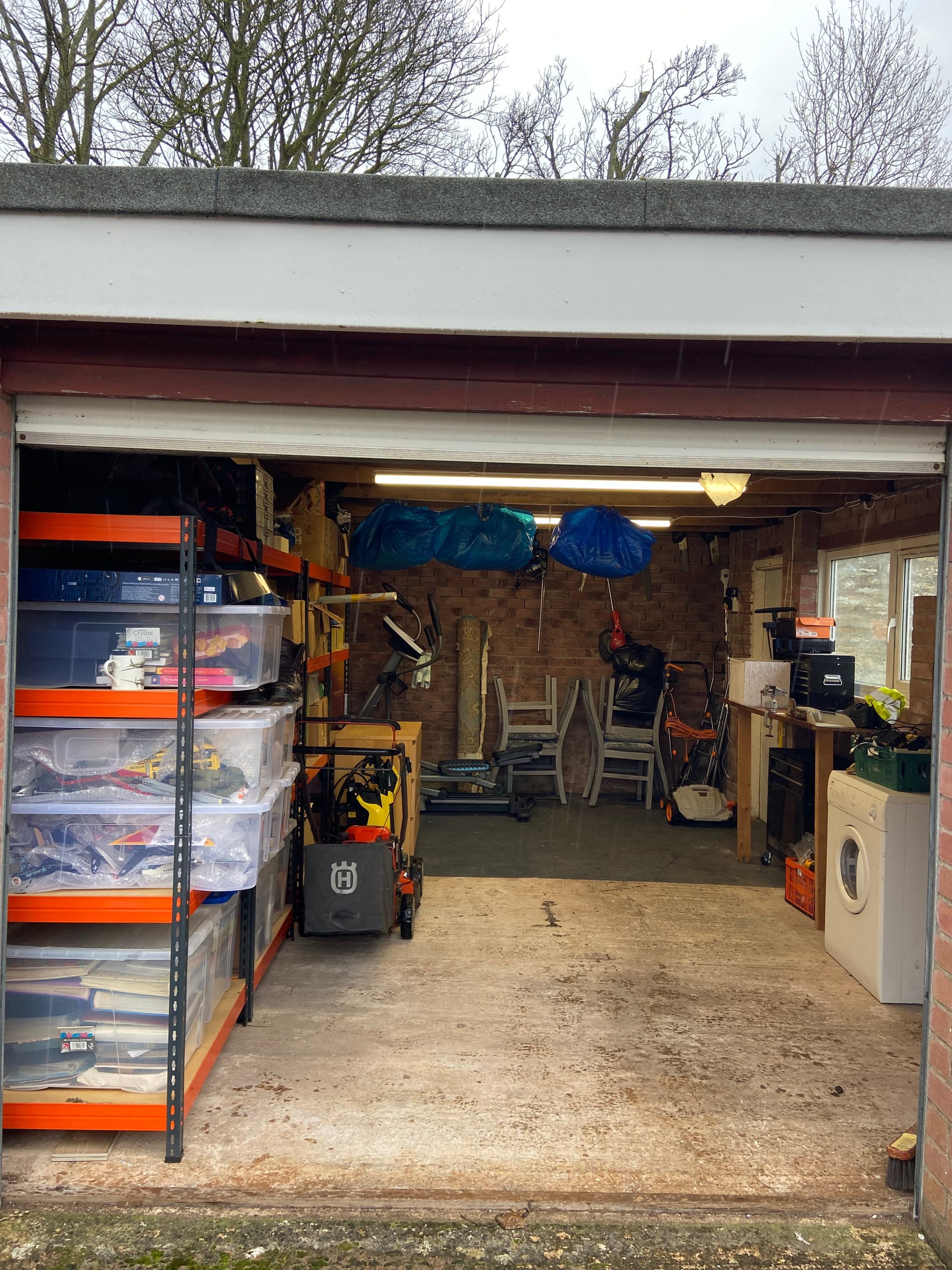 Tidy, well-organised garage and workshop after a maintenance visit